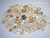 Mixed size Hawaiian Puka shell assortment showing natural colors and ocean-polished surfaces