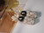 Authentic Niʻihau shells (モミシェル & Laiki) in bold blue tones paired with a genuine Tahitian pearl. Pineapple-inspired style melding color and elegance, photographed to reflect natural shell hues. :contentReference[oaicite:2]{index=2}