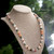 Niihau shell lei, necklace made with Tahitian pearls, Momi and Kahelelani shells