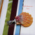 Orange and gray Hawaiian sunrise shell pendant with authentic Niʻihau shells and Kahelelani flower accent