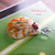 Authentic Niʻihau shell jewelry pendant featuring sunrise shell from Hawaii and Kahelelani flower accent