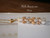 Handmade shell necklace — 17½″ Pikake-style pendant combining white, brown-spotted, blue, and light golden Momi shells for a stunning island aesthetic