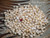 300 pcs of Yellow Momi Shells – Medium to Large Size with Black Waha, High Luster (Includes How to Create Pikake Style Shell Earrings Instructions) #2369
