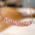 Two-strand poepoe style pendant necklace handcrafted with genuine Keʻokeʻo Kahelelani shells, 2" section with 14K gold-filled Italian chain — making Niʻihau shell jewelry with aloha.