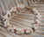 Full Hawaiian shell bracelet with kipona design combining momi and kahelelani shells, lightweight handmade island jewelry