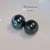 Tahitian pearls 8.7 mm close-up on white background, dark natural luster pearls used for custom Niʻihau shell earrings, elegant high quality pearls for handmade Hawaiian jewelry