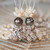 Custom order for Donna Niʻihau shell earrings in Hawaiian pineapple design, close-up showing black spotted ʻŌnikiniki Momi shells with creamy white and brown tones, topped with Lāiki shells and baroque Tahitian pearls in soft silver tone luster