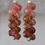 nier_3151
Tiny colorful Hawaiian shell earrings in minimalist drop style with Kahelelani shells in burgundy red, chocolate brown, and soft pink on sterling silver – small authentic Hawaii gift for her