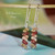 nier_3181
Hawaiian shell earrings hanging on hook showing green, burgundy and cream kahelelani shells in simple drop style, small authentic Hawaii shell jewelry under $100