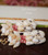 nier_2905
Hawaiian pineapple style shell earrings handmade with Niihau shells soft off white Momi with black waha pink Kahelelani and light yellow Laiki