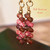 nier_2196
Close up of Niʻihau shell earrings showing colorful Kahelelani shells in brown and pink flower tones, detailed craftsmanship, small dainty Hawaiian jewelry under $150