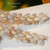 2 3/4 inch Pikake style Niʻihau shell earrings with Momi shells, authentic Hawaiian seashell jewelry gift from ShellsHawaii