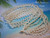 ninl_2014
Authentic four strand Laiki shell lei handcrafted with genuine off white shells from Niʻihau. Traditional Hawaiian shell necklace featuring soft natural tones, layered shellwork, and classic island-inspired style.