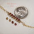 bl_706
Authentic Hawaiian shell bracelet displayed beside a dime showing the tiny scale and natural beauty of genuine Kahelelani shells in ʻōmaʻomaʻo green and mākuʻe brown tones accented with 14k gold filled chain. Delicate handcrafted Niʻihau shell jewelry with minimalist coastal elegance.