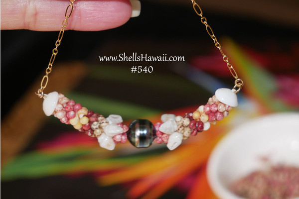 PD_540
Kipona style Niʻihau shell pendant with Tahitian pearl, Momi and Kahelelani shell jewelry for everyday wear