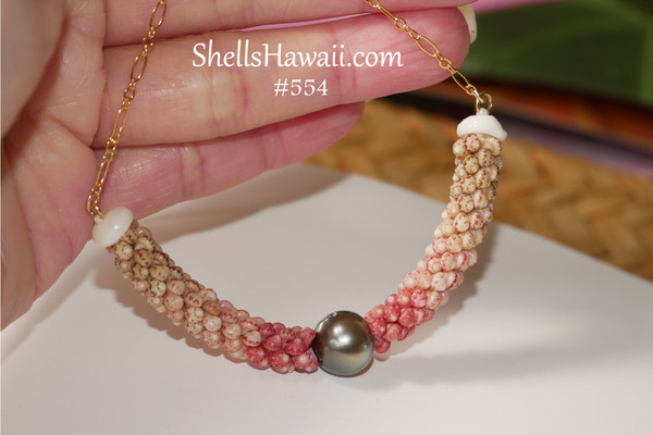 PD_554
Niʻihau shell pendant in triple-strand Poepoe style made with genuine Kahelelani shells and Tahitian pearl