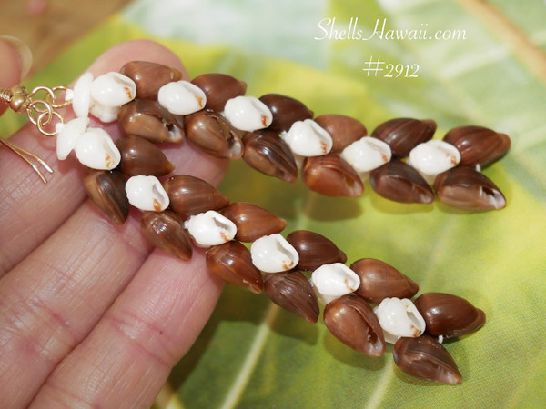 nier_2912
Hawaiian heleconia shell earrings handmade Niihau shells brown poheho and white momi with red waha long cascading design