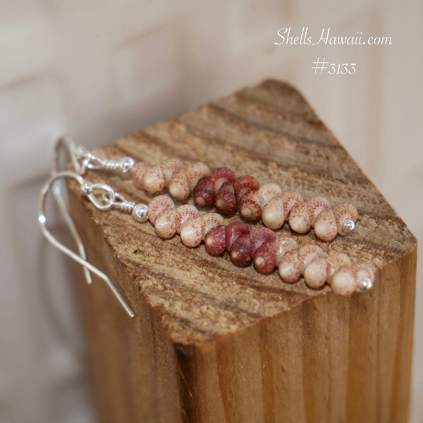 nier_3133
Dainty Kahelelani shell drop earrings from Kauai in simple minimalist style, lightweight Hawaiian jewelry shown on wood block