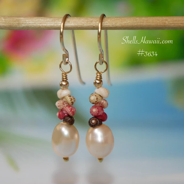 nier_3634
Dainty Niʻihau shell earrings featuring tiny colorful Kahelelani shells with peach freshwater pearls in a minimalist drop style. The natural blend of black, pink flower, green, red burgundy, and off white tones creates a soft island-inspired look perfect for everyday Hawaiian jewelry, gifting, or affordable authentic Hawaii shell jewelry.