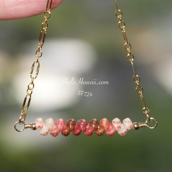 PD_724
Authentic Niʻihau shell necklace handcrafted with size 11 Kahelelani shells in keʻokeʻo off white, pink flower, brown, and deep red burgundy tones arranged in a soft ombre floating design on delicate 14k gold filled chain.