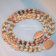 Option 1 (Niʻihau shell lei):
21″ Niʻihau shell lei in a unique blend of Kipona and Crown Flower styles, featuring Momi and Kahelelani shells in blue, yellow Lenalena, white Keʻokeʻo, and multicolor accents