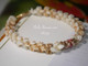 Handcrafted Niʻihau shell bracelet — 7″ Kipona style design combining Momi and Kahelelani shells, strung on a 14K gold-filled safety clasp, showcasing authentic Hawaiian craftsmanship