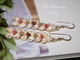 1⅝″ Heliconia Flower style Niʻihau earrings with off-white and soft yellow Momi shells, accented by pink flower, green, black, and brown Kahelelani shells. Evoking a lush tropical garden in bloom.