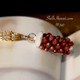 Authentic Niʻihau shell pendant — 17½″ Poepoe-style necklace featuring burgundy Kahelelani shells with Italian 14K gold-filled findings