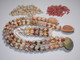 Option 1 (Niʻihau shell lei):
20″ Niʻihau shell lei with matching earrings, featuring a rare blue-gray Moonrise shell pendant and lustrous Momi & Kahelelani shells