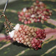 Handcrafted Niʻihau Kahelelani earrings featuring Poepoe style design with ʻUlaʻula, ʻĀkala Pua, ʻŌmaʻomaʻo, and Keʻokeʻo shells