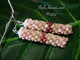 Luxury Hawaiian earrings — 1 5/8″ Poepoe style Niʻihau shell design using genuine Kahelelani shells size 13.5, showcasing natural Keʻokeʻo white with pink tones, green, and burgundy, handcrafted with aloha.