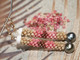 Authentic Niʻihau Kahelelani three-strand Poepoe earrings with Tahitian pearls; pink ʻākala pua, brown mākuʻe, green ʻomaʻomaʻo shells; #2635