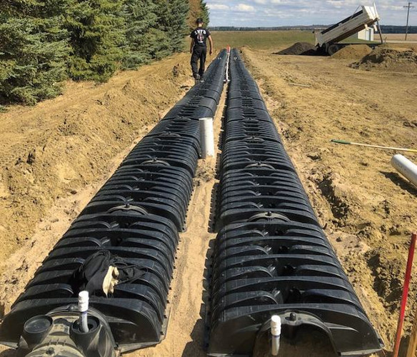 Efficient Septic Solutions: Low-Profile Chambers, Distribution Boxes, and High-Quality Retaining Walls for Architectural Enhancement