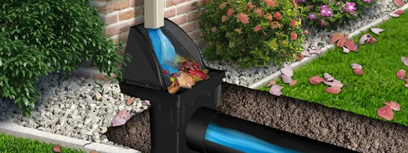 Downspout catch basin collecting rainwater and filtering leaves before directing water into an underground drainage pipe.