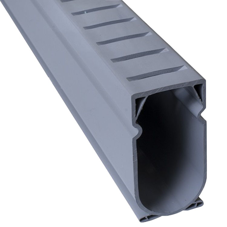 Stegmeier deck drain system in gray designed for surface water management in landscape and hardscape applications.