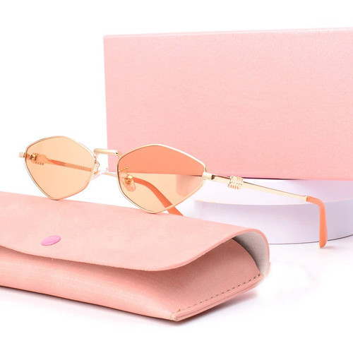 Y2K Vibes Miu Miu Geometric Orange Lens Sunglasses MU56ZS