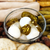 Spicy Garlic Dill Quail Eggs in a bowl