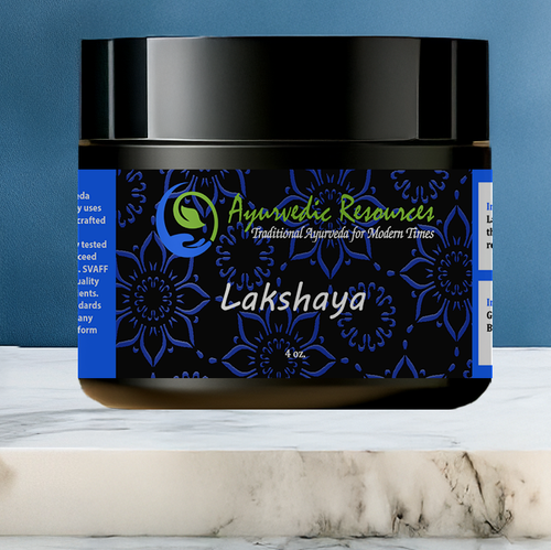 4 oz. Lakshaya Transdermal Cream on a marble shelf.