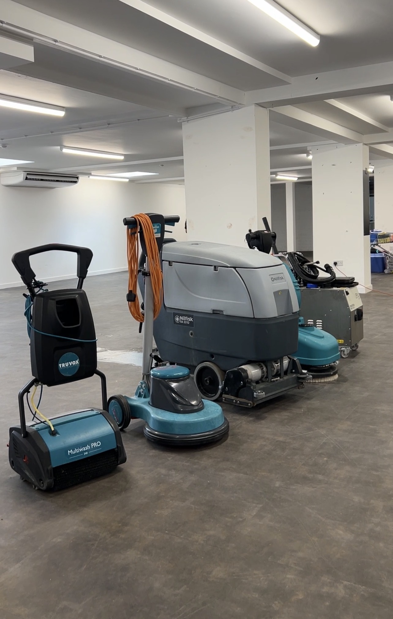 Professional commercial floor-cleaning equipment used by Herits Commercial Services