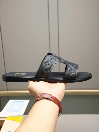 Louis Vuitton Slides Black Embossed Monogram Leather