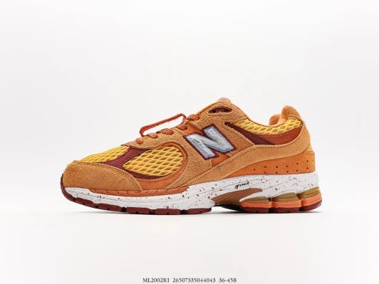 New Balance 2002R1 Orange Suede Mesh Sneakers