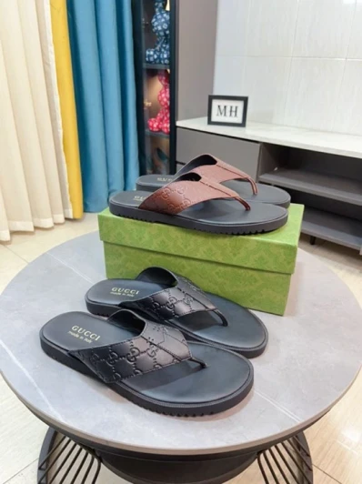 Gucci Men's Flip Flops Embossed Leather Black
