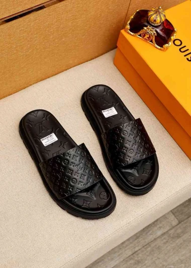 Louis Vuitton Slides Black Monogram Embossed Leather