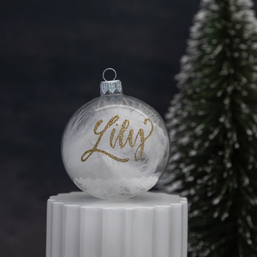 clear personalised christmas bauble with white feathers 10cm