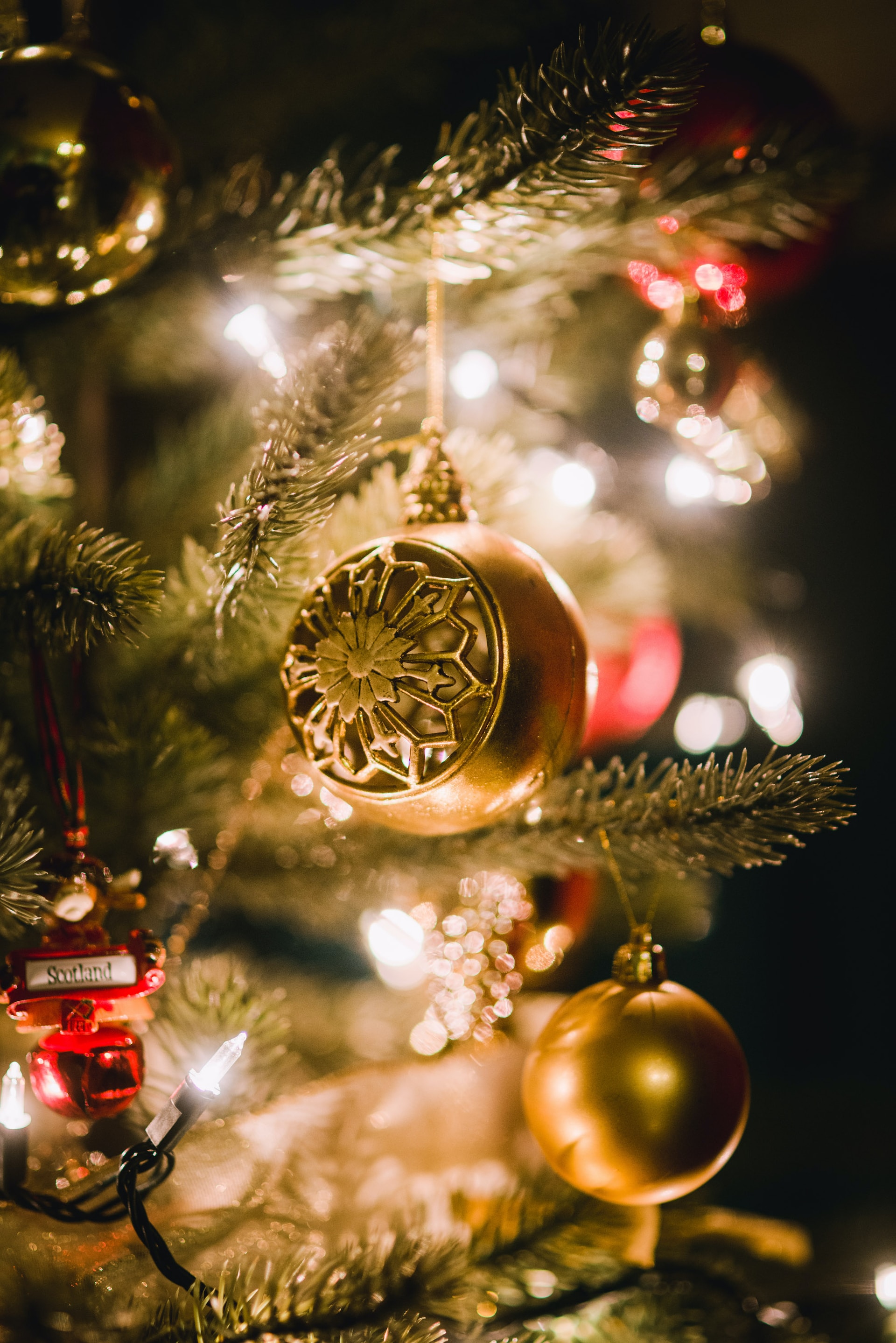 What is the symbolism of the ornaments hung on the Christmas tree? - Artisan Ornaments