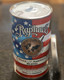Printed Tin with seamed top, degassing valve, and metal cap.