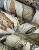 Détail du motif texturé et des finitions soignées du produit Atlantis.