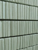 Vue en perspective du carreau façade vertical long 5,4 x 36 cm S.02 mettant en valeur sa texture et 