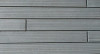 Carreau façade rectangulaire Niva S.03, teinte gris graphite et blanc écru, dimensions 5,4 x 54 cm.