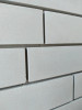 Carreau façade lisse long 5,4 x 54 cm S.01 – Gris, graphite, blanc, écru – Vue générale du produit.